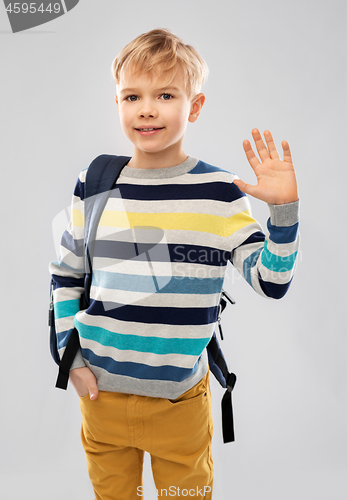 Image of smiling student boy or schoolboy with school bag