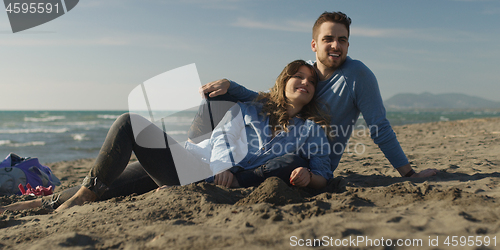 Image of Couple enjoying time together at beach