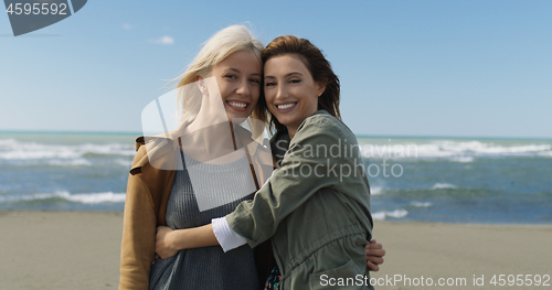 Image of Women Smiling And Enjoying Life at Beach