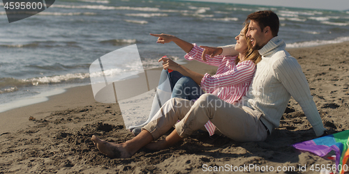 Image of Couple enjoying time together at beach