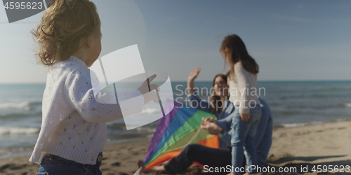 Image of Young family enjoying vecation during autumn