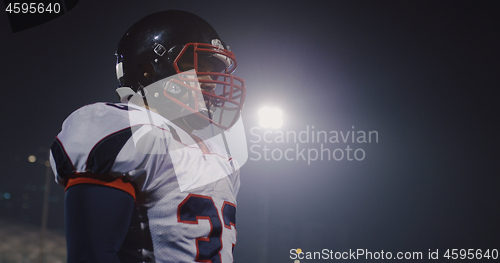 Image of portrait of young confident American football player