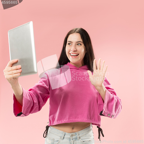 Image of Businesswoman with laptop. Love to computer concept.