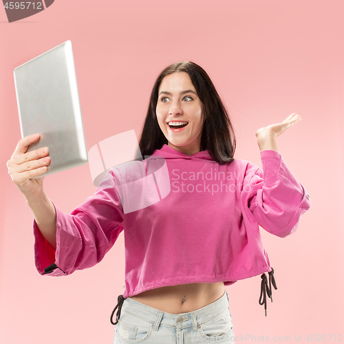 Image of Businesswoman with laptop. Love to computer concept.