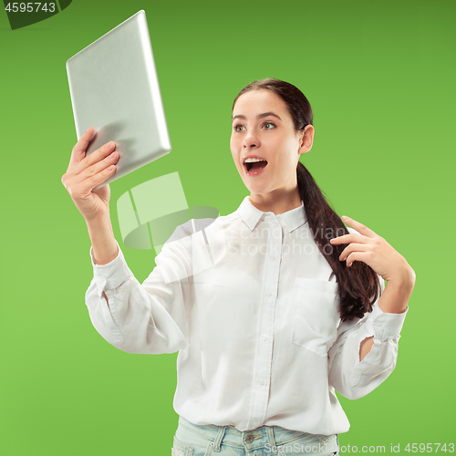 Image of Businesswoman with laptop. Love to computer concept.