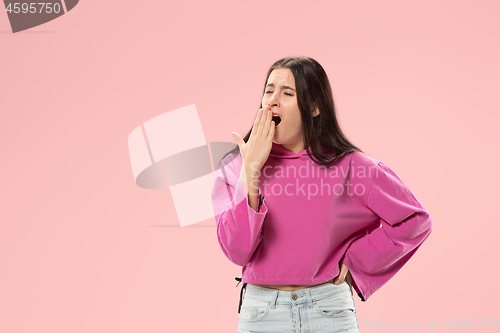 Image of Beautiful bored woman bored isolated on pink background