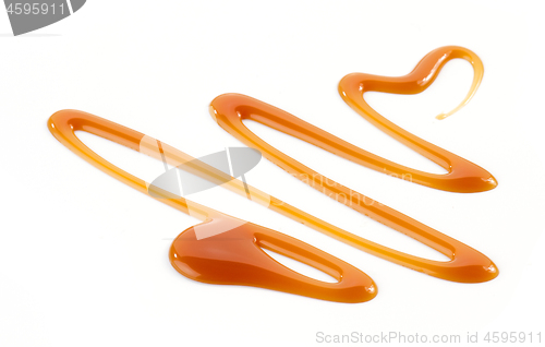 Image of caramel sauce on white background