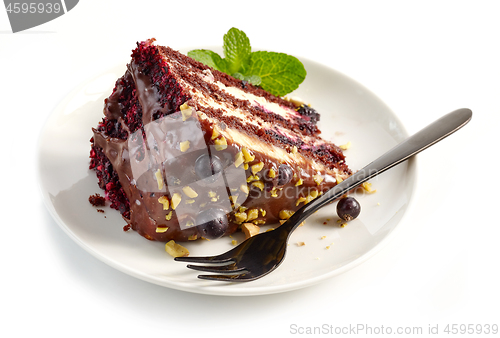 Image of piece of chocolate and blackcurrant cake