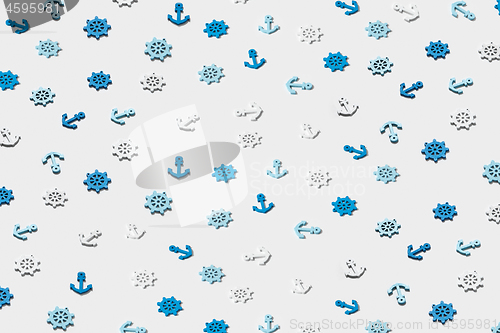 Image of Pattern from small marine symbols with shadows.