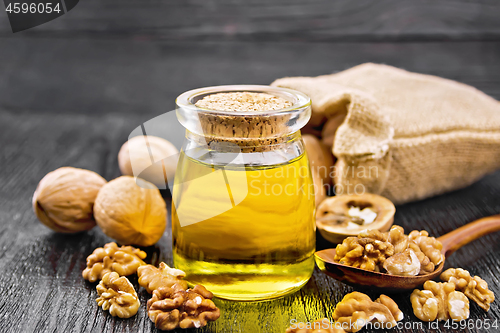 Image of Oil walnut in jar on board