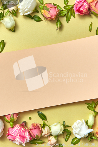 Image of Greeting card with fresh natural flowers frame.
