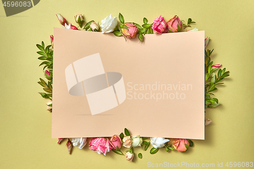Image of Paper congratulation card with flowers frame.