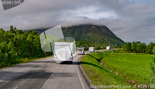 Image of VR Caravan car travels on the highway.