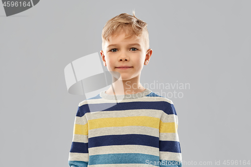 Image of portrait of nice boy in striped pullover