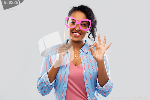 Image of happy african american woman with big glasses