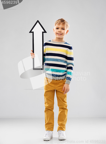 Image of boy in striped pullover with upwards thick arrow