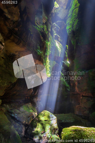 Image of Light beams into the canyon