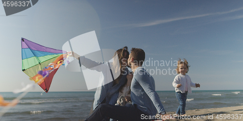 Image of Young family enjoying vecation during autumn