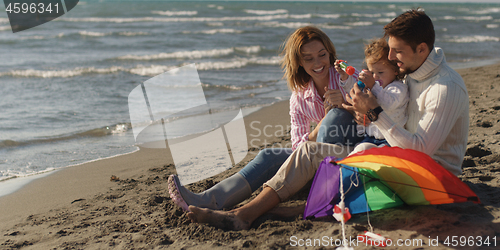 Image of Young family enjoying vecation during autumn