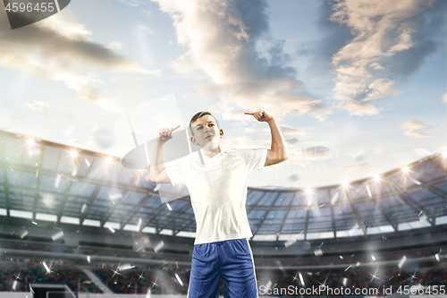 Image of Young boy as winner at stadium