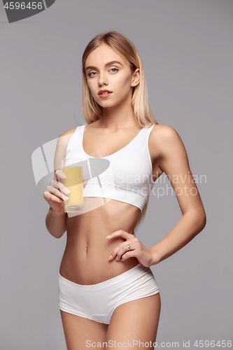 Image of Perfect slim toned young body of the girl .