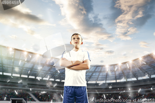 Image of Young boy as winner at stadium