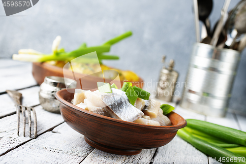 Image of herring with potato