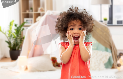 Image of surprised or scared little african american girl