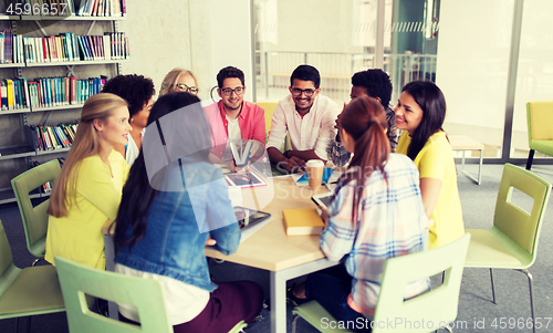 Image of group of high school students sitting at table