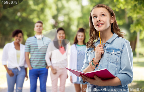 Image of teenage student girl with diary or notebook