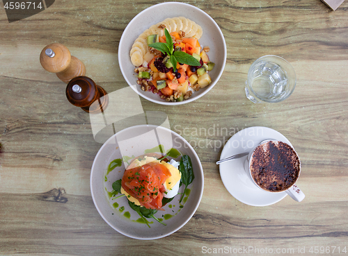 Image of Delicious breakfast plates on table