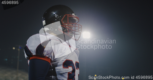 Image of portrait of young confident American football player