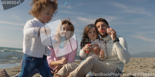 Image of Young family enjoying vecation during autumn