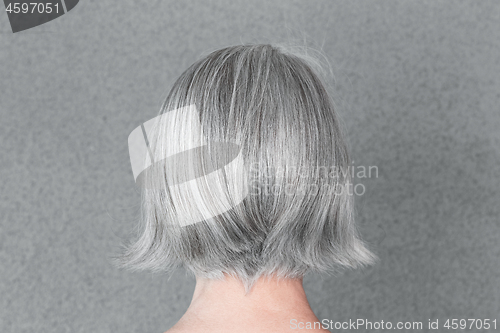 Image of Woman with beautiful natural gray hair