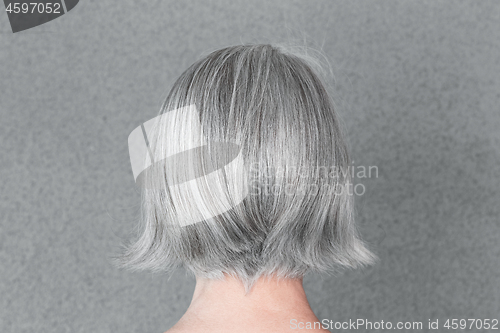 Image of Woman with beautiful natural gray hair