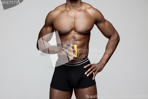Image of Fit young man with beautiful torso isolated on white background