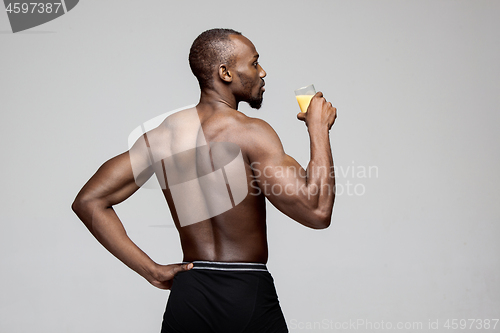 Image of Fit young man with beautiful torso isolated on white background