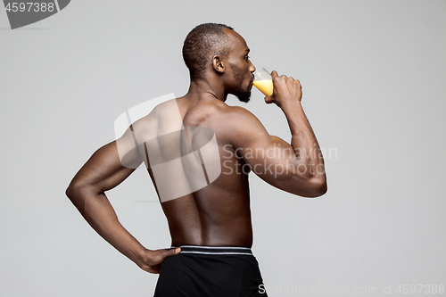 Image of Fit young man with beautiful torso isolated on white background