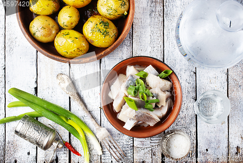 Image of herring with potato