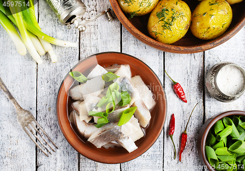 Image of herring with potato