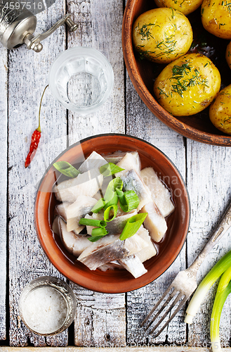 Image of herring with potato