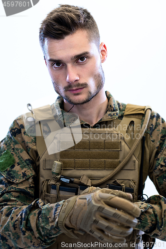 Image of closeup of soldier hands putting protective battle gloves