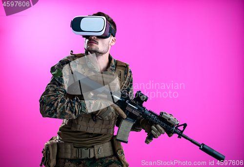 Image of soldier in battle using virtual reality glasses