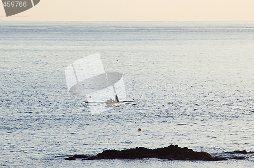 Image of Rowboat approaching in Pico,  Azores