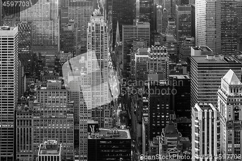 Image of New York City skyline with urban skyscrapers at sunset, USA.