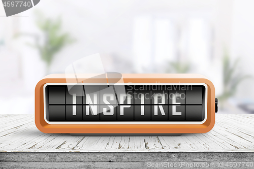 Image of Inspire message on a retro alarm device