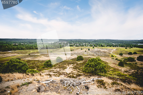 Image of View from a hill in the summer with dry plains