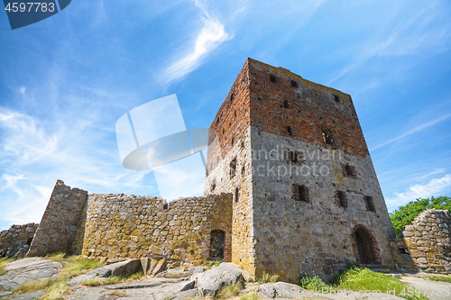 Image of Castle ruin under a blue sky in the summer