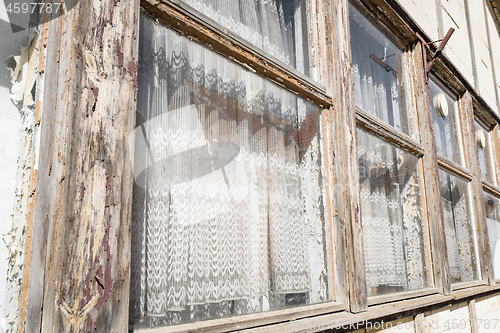 Image of Old wooden windows on a row