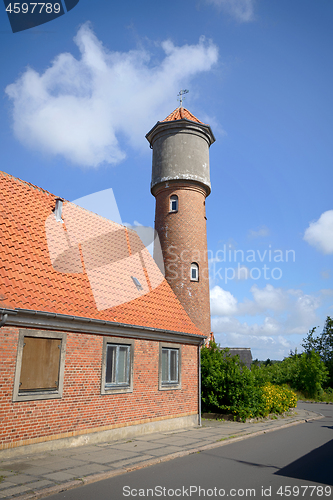 Image of Tower on a city street made of red bricks